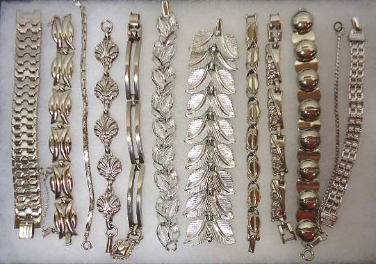 Lot of Silver Bracelets: 12 Silvertone bracelets, 1 Monet & 1 Avon
