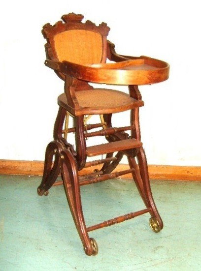 Victorian Walnut Collapsible High Chair Stroller: also converts to rocker. Condition appropriate wear for age .h. 36" w. 14 1/2" d. 25"