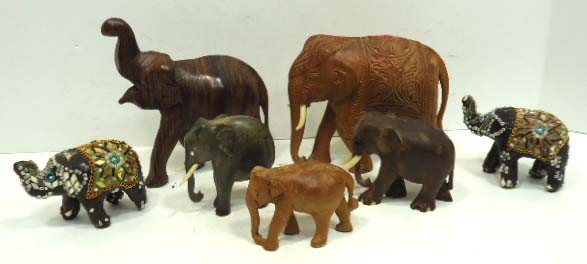 7 Pc. Carved Elephants: 2 3/4" to 5"-4 Have Ivory Trunks