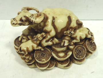 Oriental Carving ( Ox): 3 1/4"