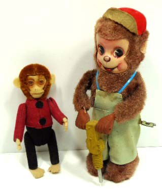 Key Wind Jack Hammer Monkey Jointed Monkey Perfume: 4 3/4" & 7 1/2" Jointed monkey is a Schuco perfume