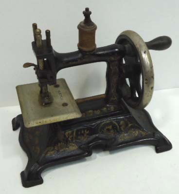 Cast Iron Stenciled Childs Sewing Machine: 8"