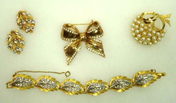 Vtg. Designer Sgnd Rhinestone Jewelry Lot: Inc. 7" Marboux Bracelet Pave & Gold-tone Safety Chain Roman Bow Brooch 2 1/8" Crown Trifari Tear Drop Rhinestone & Gold-tone Earrings, 1 3/4" Pell Pearl Brooch