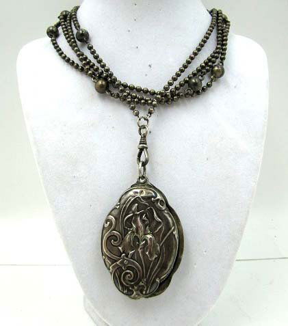 Art Nouveau Silver Bead Swivel Chain & Locket: 58 1/2" Silver Bead Chain Ending in A Swivel 2 1/2" x 1 1/2" Art Nouveau Locket, Not Marked but I believe both are silver
