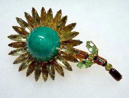 Vtg Judy Lee Floral Jade Matrix, Navette Pin: 3" x 1 3/4" Floral Brooch w/ 22mm Domed Jade Matrix Cabochan & Olive Green Navette's. Goldtone, Prong Set. Sgnd Judy Lee