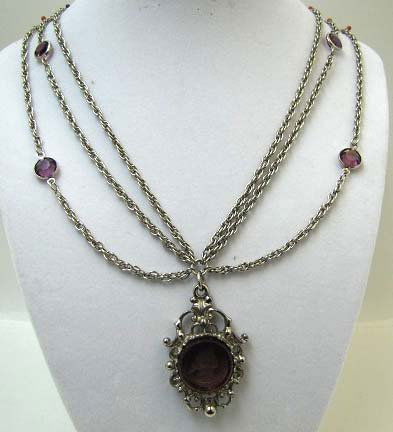 Vtg. Purple Intaglio Pendant/Multi Chain Necklace: 26" Silver Multi-Chain Necklace w/ 6 Bezel Set Purple Glass Stone & 1 7/8" Purple Intaglio Pendant in a Carved Frame. Lovely