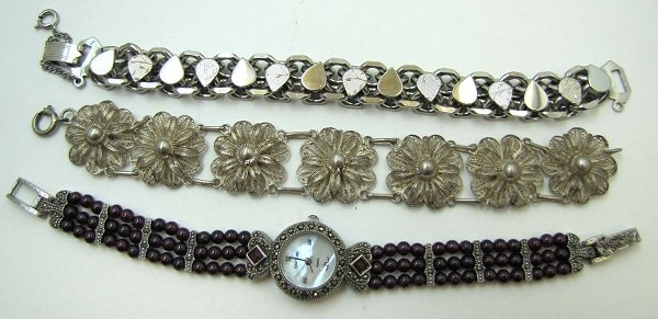 3 Vtg. Silvertone Bracelet's: Inc. 7 1/2" Heavy Silvertone Link Bracelet/ Safety Chain, Un-signed, Good Quality. 7 1/2" Spun Silver Bracelet. 7 1/2" Cranberry Glass Bead Watch.