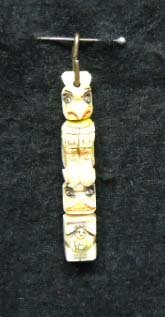 Pre Ban Carved Ivory Totem Pendant: Carved & Tinted Ivory Totem 2 1/4"