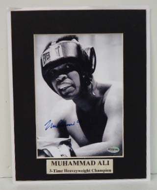 Muhammid Ali Autographed Photo COA: 9 1/2" x 7 1/2"
