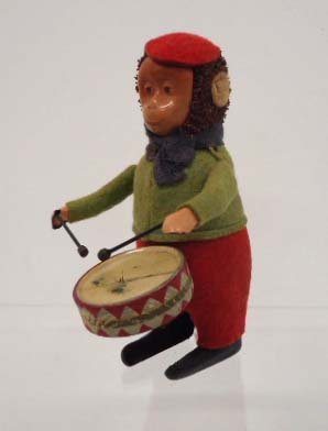 Keywind Drumming Monkey: Works, 4 1/2"T Celluloid Face and Hands. Missing Key