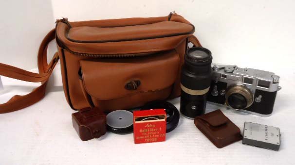 Leica M3 Camera: Leica M3 Camera. Leitz 1:2 5cm & Leitz 1:4.5 135cm Lenses. I was just told that the shutter curtains have a problem, they are not closing properly