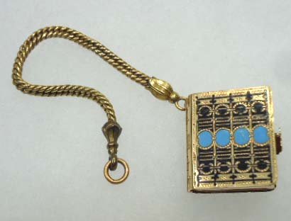 Enameled Chatelaine Photo Album: 1" x 7/8" Enameled Brass Chatelaine Photo Album w/ 6 Photo's - 5 I believe to be Daguerreotypes. On 4 1/4" Chain.