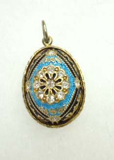 Diamond Fabrege Egg Pendant: 7/8" x 5/8" Blue/Blk Basse-Taille Enameled Fabrege Egg Pendant Covered in 26 Brilliant, Tested Daimonds. No Markings. .349oz