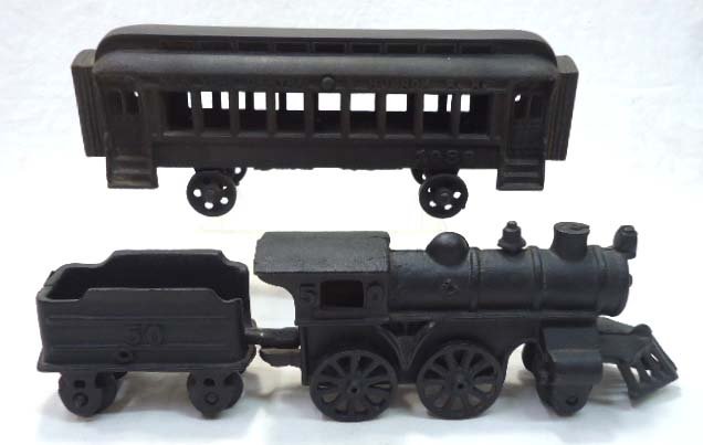 Iron Art Train Engine & Cars: Iron Art JM-240R on Inside Cast Iron 2pc Engine, Tender, & Passenger Car. New York Central. Engine & Tender are 11" x 3", Pass. Car 9 1/2" x 3 1/2"