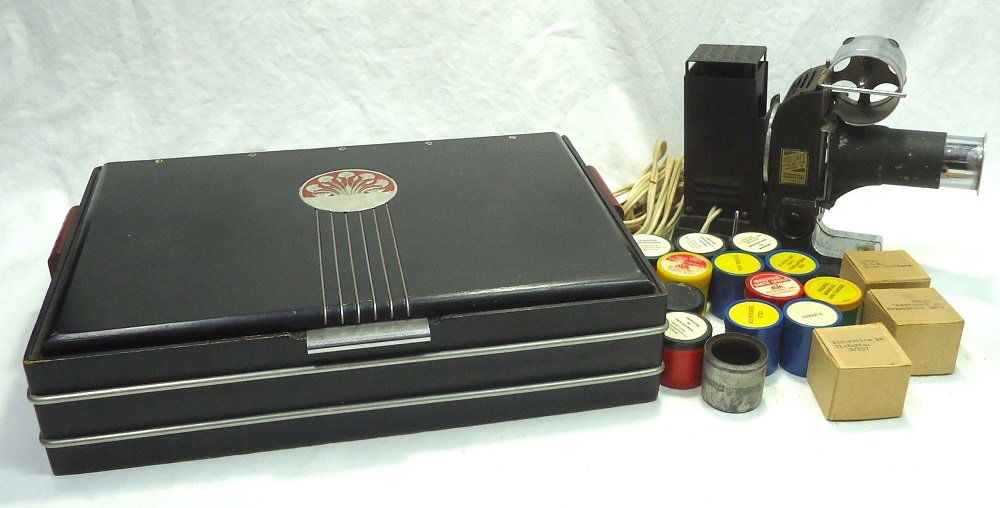 Argus Mdl. B Projector & Films: Box 15" x 10" x 3 1/2" Projector 6 3/4"T