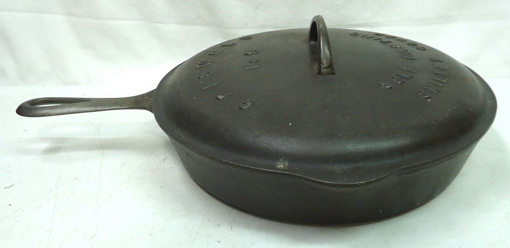 Griswold 9" Skillet & Lid: 710 Skillet & 469 B Lid 16" x 12 1/4"