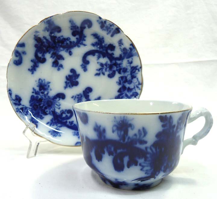 Flow Blue Cup & Saucer: Cup 2 1/2"T, Saucer 6 1/4"W