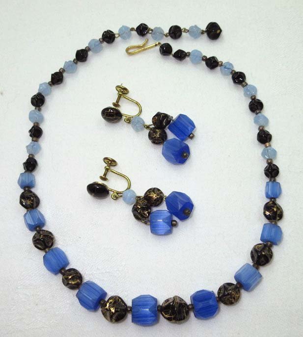 Lovely Deco Blue/Black Art Bead Choker Set: 17" Choker w/ Alternating 5 Sided Blue Glass Bead & Black/Gold Nugget Bead Choker w/ Sm. Opalescent Blue Bead Choker w/ Matching 1 4/8" Dangle Screw back Earrings. Mrkd W Germ.