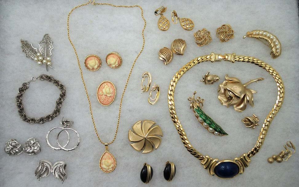 20 Pc. Trifari Jewelry Collection.: Inc. 2 3/4" Enameled Faux Pea's in a Pod Pin, Lovely Carved Resin Rose Neck, Pin & Earring Set, Dimensional Goldtone 2 1/2" Rose Brooch & Earrings + 9Prs of Earrings, 3 Pin's, 1 Bracelet & a Heavy Gol