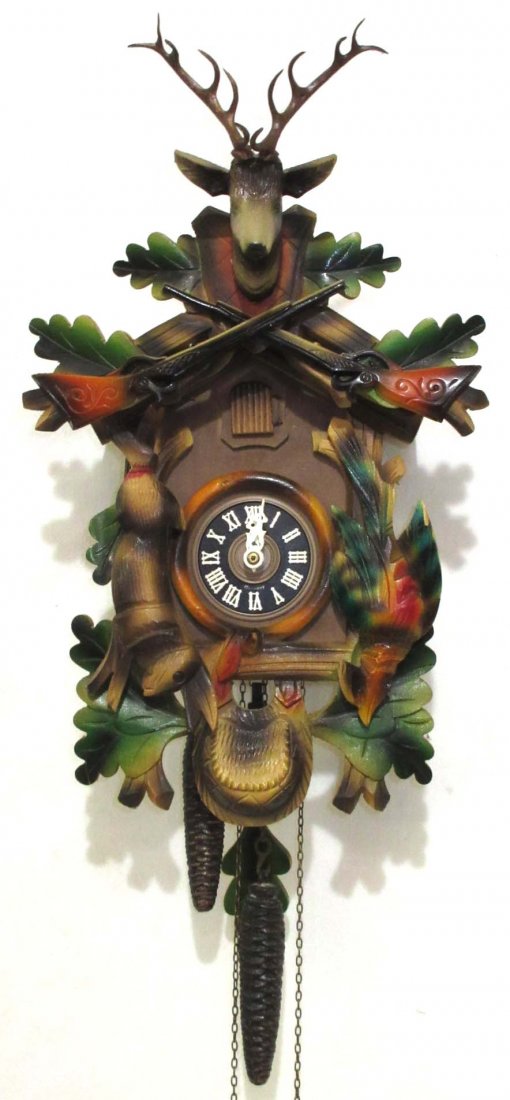 German Cuckoo Clock: 2 wt. 10"W x 13" x 9"D We do not guarantee working order of clocks