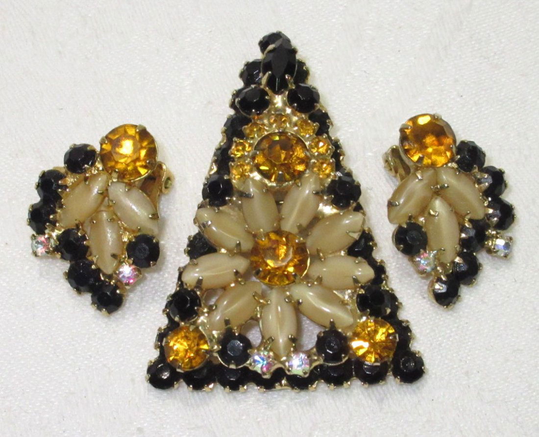 Book Pc D&E Juliana Autumn Pend/Brooch Set: Great 2 1/4" Triangular Dimensional Pendant/Brooch with Black/Amber Chaton & marquise & Cream Moonstone Marquise Flower Center. Very Interesting! With Matching 1" Earrings. Goldtone. Seen on pg. 237 o