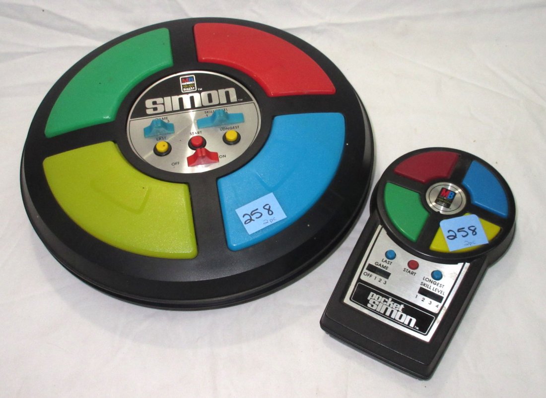 2 Simon Computer Controlled Games: 10 1/2"W x 2 1/2" & 7" x 4" x 1 1/2" Games, One is a Pocket Simon