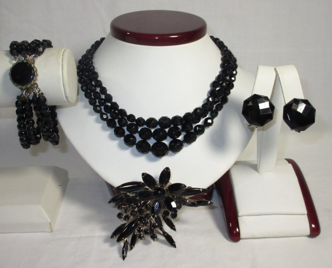 Black Glass Neck.-Brac.-Pin & Earrings Collection: Made In Germany 13"-3 Strand Choker w 1 3/4" Ext., 7 1/2"- 4 Strand Blk Glass Bracelet w/ Box Clasp, 3/4" Faceted Blk Glass Earrings & 3" Black Glass Brooch. Not a Set, But Looks Good Together.