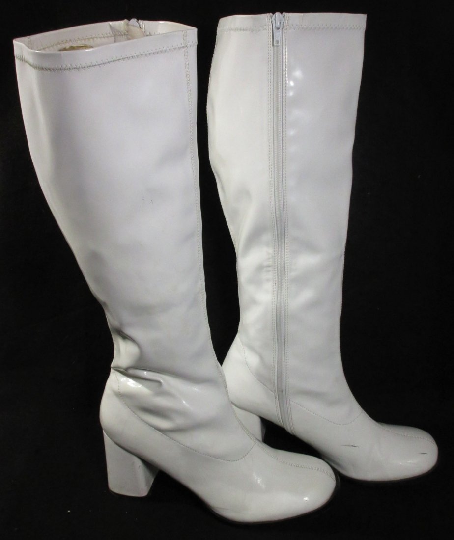 White Plastic Reproduction "GO GO" Boots: Approx. Size 8/9 Knee High White Plastic Reproduction "GO GO" Boots with Side Zipper. 9 3/4" Long Foot w/ 2 1/2" Heel & 17" Leg.
