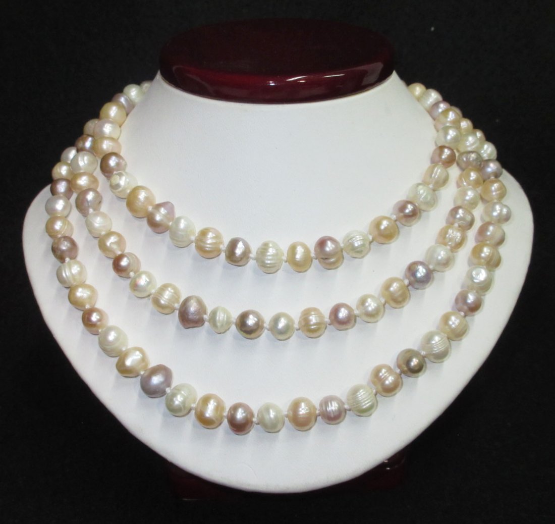 Fabulous 70's H.T.'d Genuine Circle Pearl Necklace: 46" Pink,Cream,Peach Genuine 7.7 to 9.6mm Circle Pearl Hand Tied Necklace. Quality