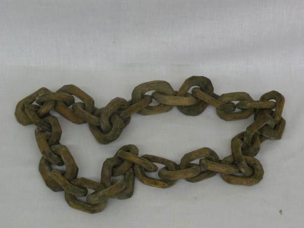 Magic lantern and carved wooden chain: both ca. 1880-1910; Magic Lantern in green wooden case with black painted tin lantern and burner marked "WIENER FLACHBRENNER", includes stack & 15 glass slides, 12 ¾"x 8"x 11 ½"; carved wooden chain