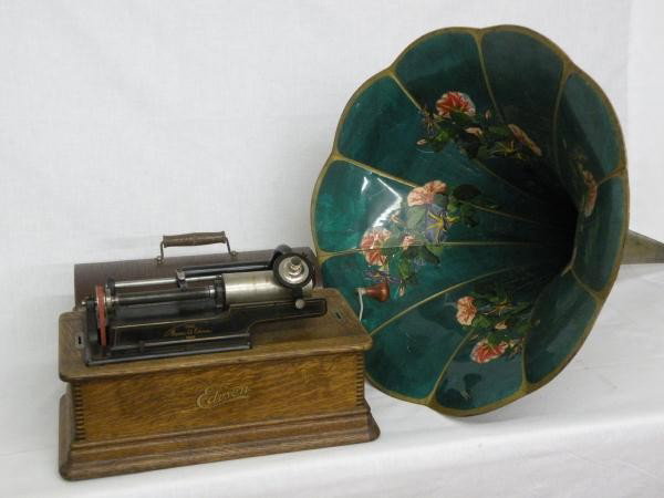 Edison "Home" phonograph: ca. 1910, oak case with a large morning glory horn and 6 cylinders, model H-4 minute reproducer, 13 ½"x 16 ¾"x 9 ½";