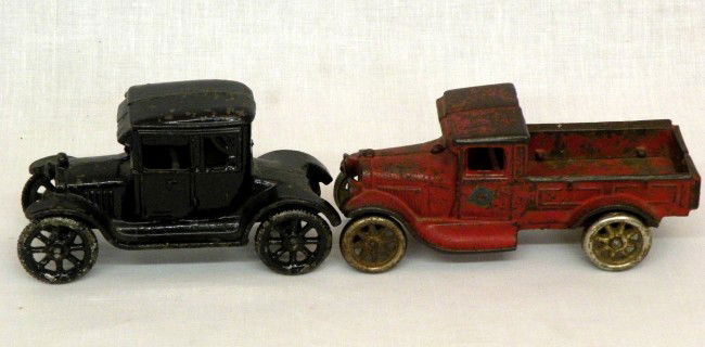 2 cast iron vehicles: ca. 1925; Arcade pick-up truck, 6"; Dent 2 door coupe, 5 ½";
