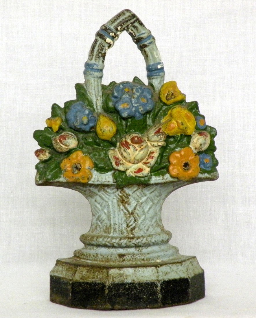 Basket of flowers iron doorstop: ca. 1910-20; 8 ½";