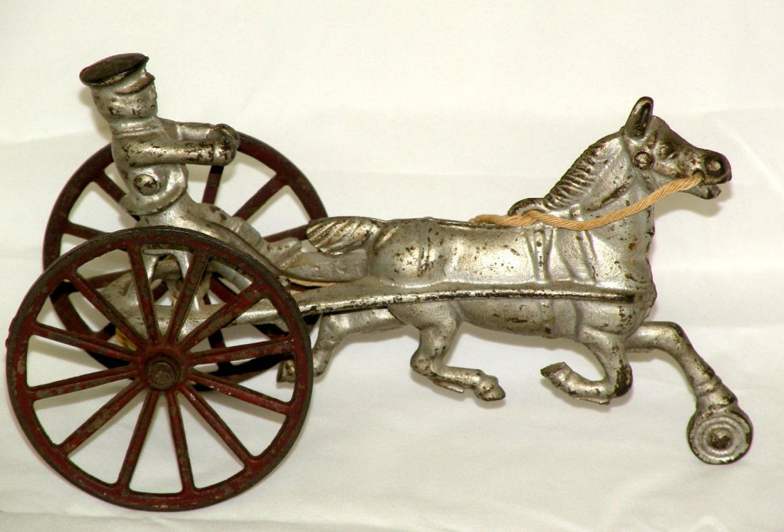 Cast iron horse & sulky: ca. 1920; 8 ½";