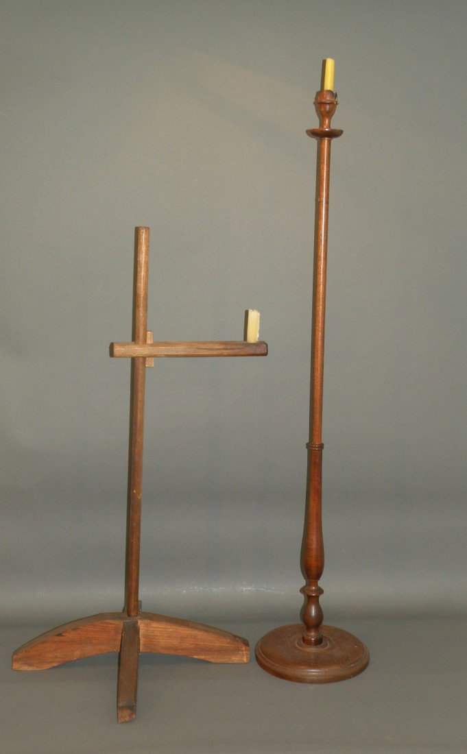 Wooden floor candlestick & candle stand: ca. 1870-1950; colonial revival mahogany candlestick with turned shaft terminating a candle socket, 10"x 48 ½"; chestnut base with wooden rod & adjustable candle arm, 20"x 20"x 37 ½";