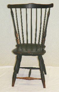 Fan back Windsor chair: ca. 1790-1810; Windsor chair in green paint with turned legs, T stretcher, shaped crest rail, 16"x 17"x 36 ½";