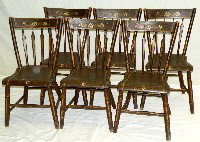 Paint decorated rocking chair & 6 plank bottom cha: ca. 1835-60; rocking chair with scrolled arms & ¾ spindle back with boldly shaped crest rail; 6 arrow back chairs;