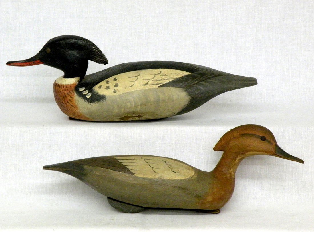 Pair of Davison Hawthorne red breasted merganser de: ca. 1970's; both signed with lead weights, leather line ties, slightly turned heads & rusty tack eyes, solid wood, 16";