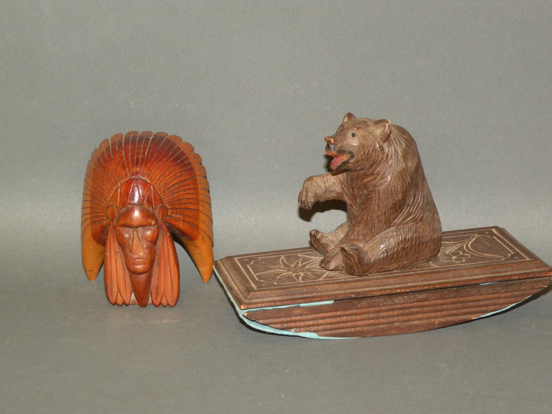Snavely Indian chief & black forest bear carving: ca. 1890-1960; solid wood Carl Snavely carved Indian chief head signed "Snavely", 4"x 3"; bear carving on ink blotter with tiny black glass eyes, open mouth and raised paw, 7"x 4";