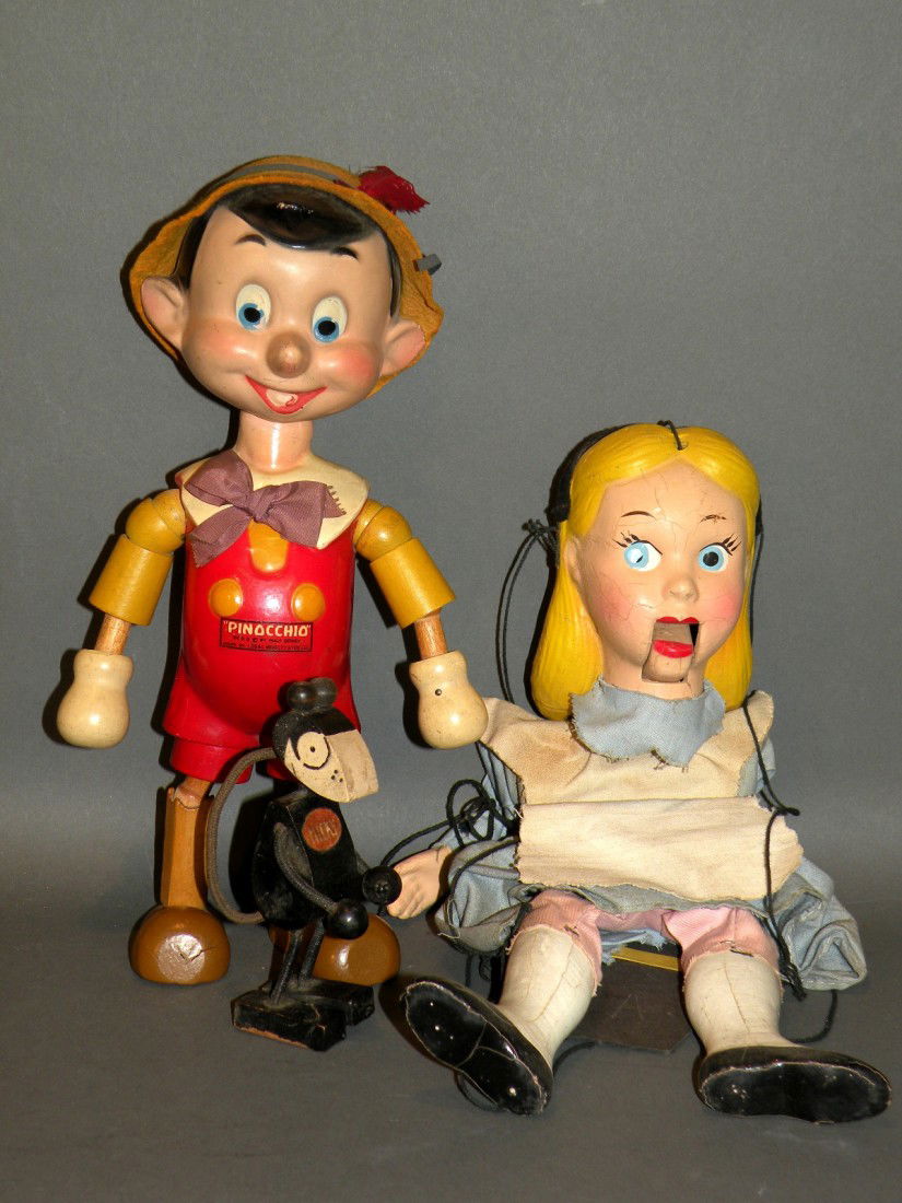 3 Walt Disney toys: ca. 1927-50; Ideal wood and composition Pinocchio jointed doll, 11"; wooden Mickey Mouse, 5"; Alice in Wonderland marionette, 12";