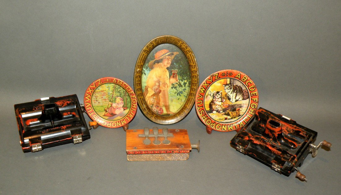 3 musical toys & 3 trays: ca. 1910-20; 2 bakelite rolmonicas; one German three-note horn; 1916 Coca-Cola tip tray, 6"; two Ohio Art tin lithograph ABC toy dishes, 3 ½"d & 4 ¼"d;