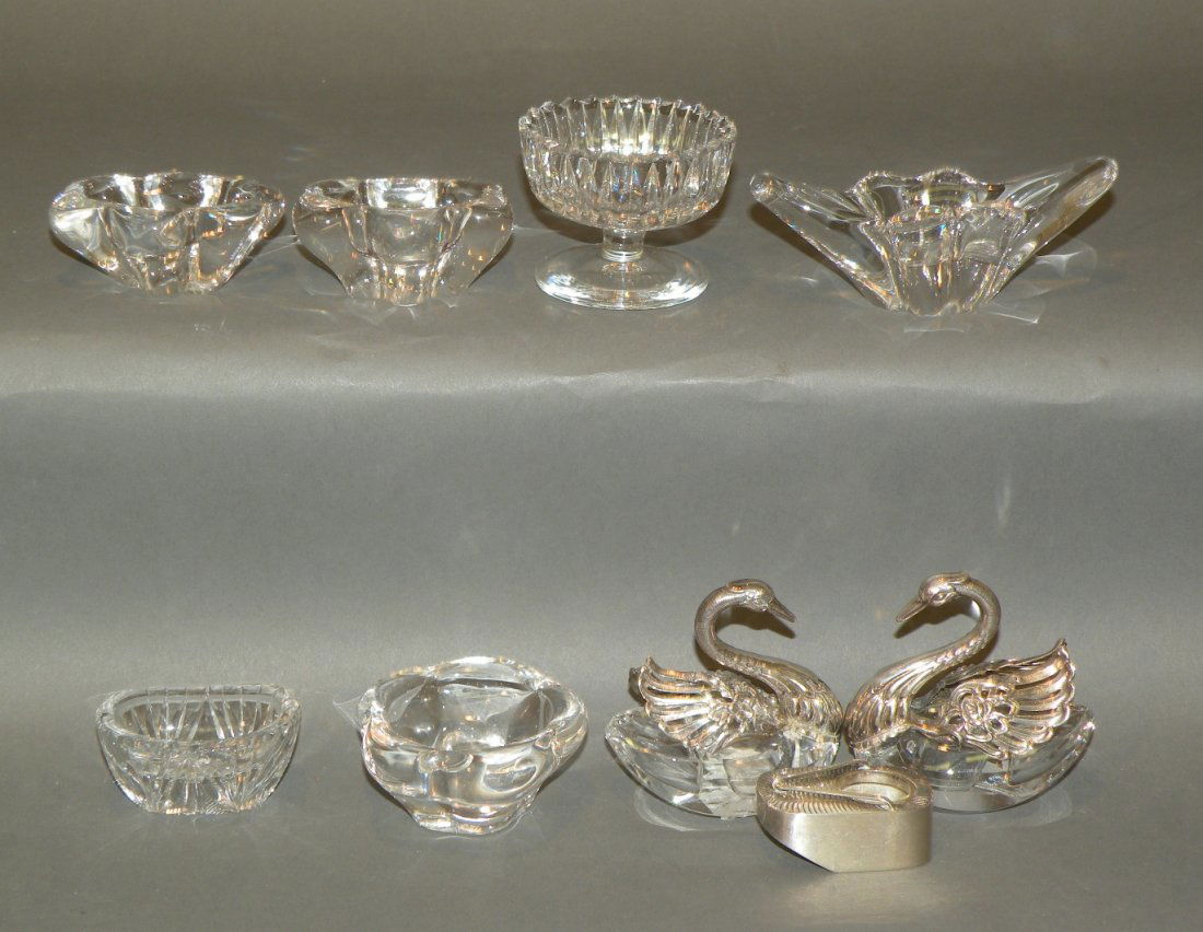 3 sterling & 6 glass salts: ca. 1900s; two cut glass salts with sterling swan tops, 2 ¾”; sterling example; two signed Daum Nancy salts in original box and four other examples;