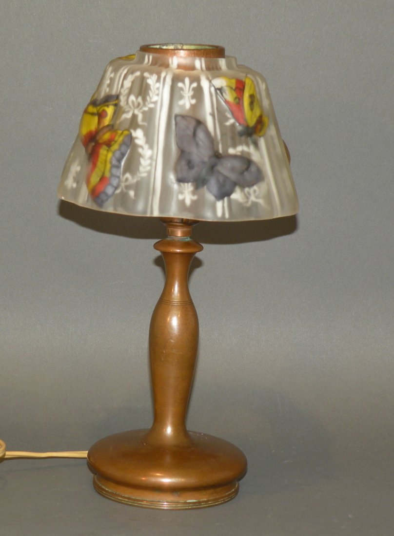 Pairpoint Mfg Co #3078 boudoir puffy lamp: ca. 1910; bronze base stamped “Pairpoint Mfg Co” with original “lacquered” sticker on base and a puffy butterfly pattern shade, 5 7/8”d, 10 ½”h;