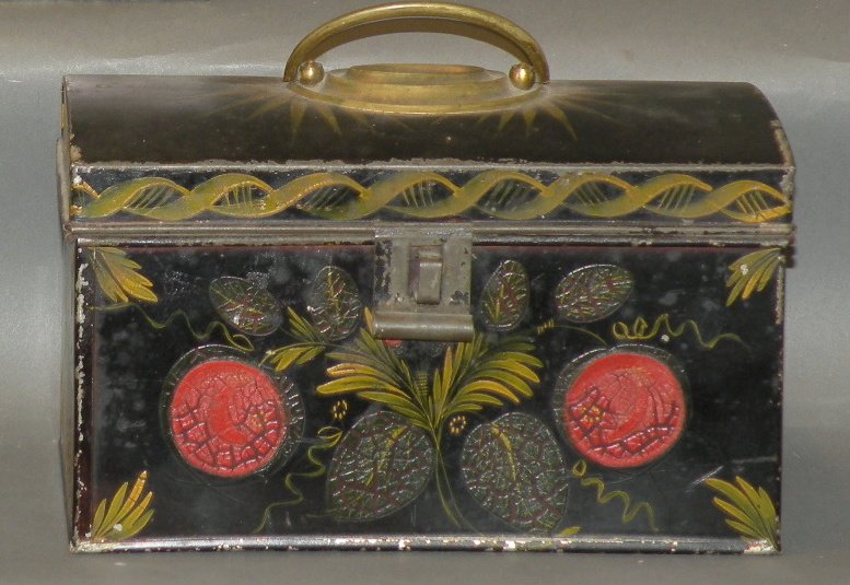Toleware document box: ca. 1820-60; with paint decoration of pomegranate and foliage with oval brass handle on lid and “Catherine White” scratched on bottom, 8”x 4”x 4 7/8”;
