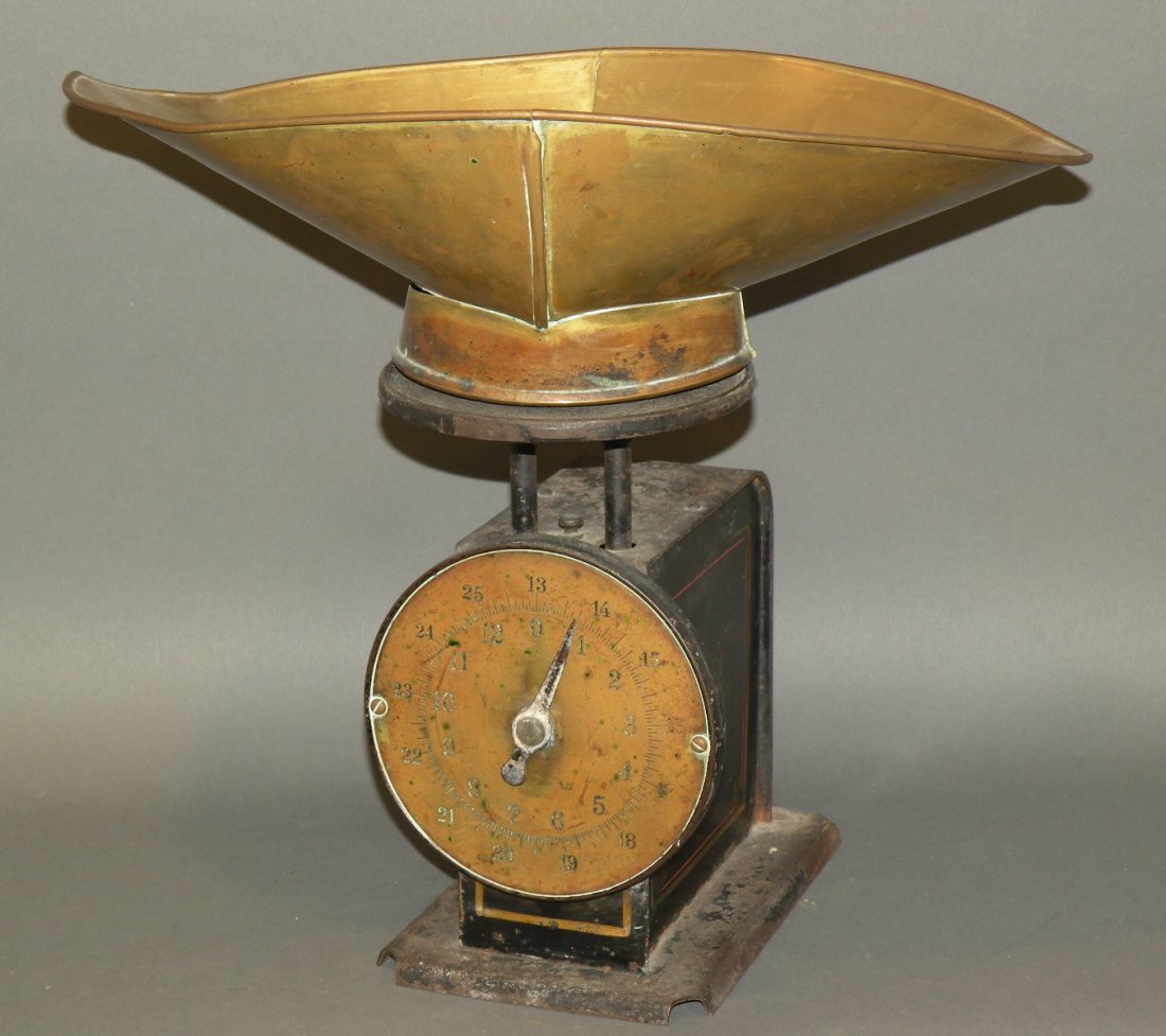 Standard family scale with brass scoop: ca. 1870-1900; iron and tin painted black with original stencil decoration, brass engraved dial, brass scoop and remnants of paper label on underside, 11”x 14 ½”x 13 ¼”;
