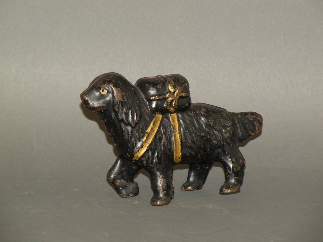 A.C. Williams cast iron St. Bernard bank: ca. 1920; with pack, 5 ½”x 3 ¾”;