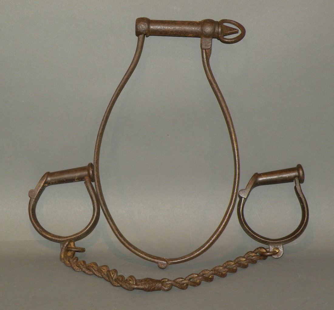 Hand wrought waist shackle & pair of wrist shackle: ca. 1820-70; waist shackle signed “PLF”, 13 ½”x 7 ¾”x 1”; pair of wrist shackles signed “Prov Tool Co”, 26 ¼”x 4 1/8”x 1”;
