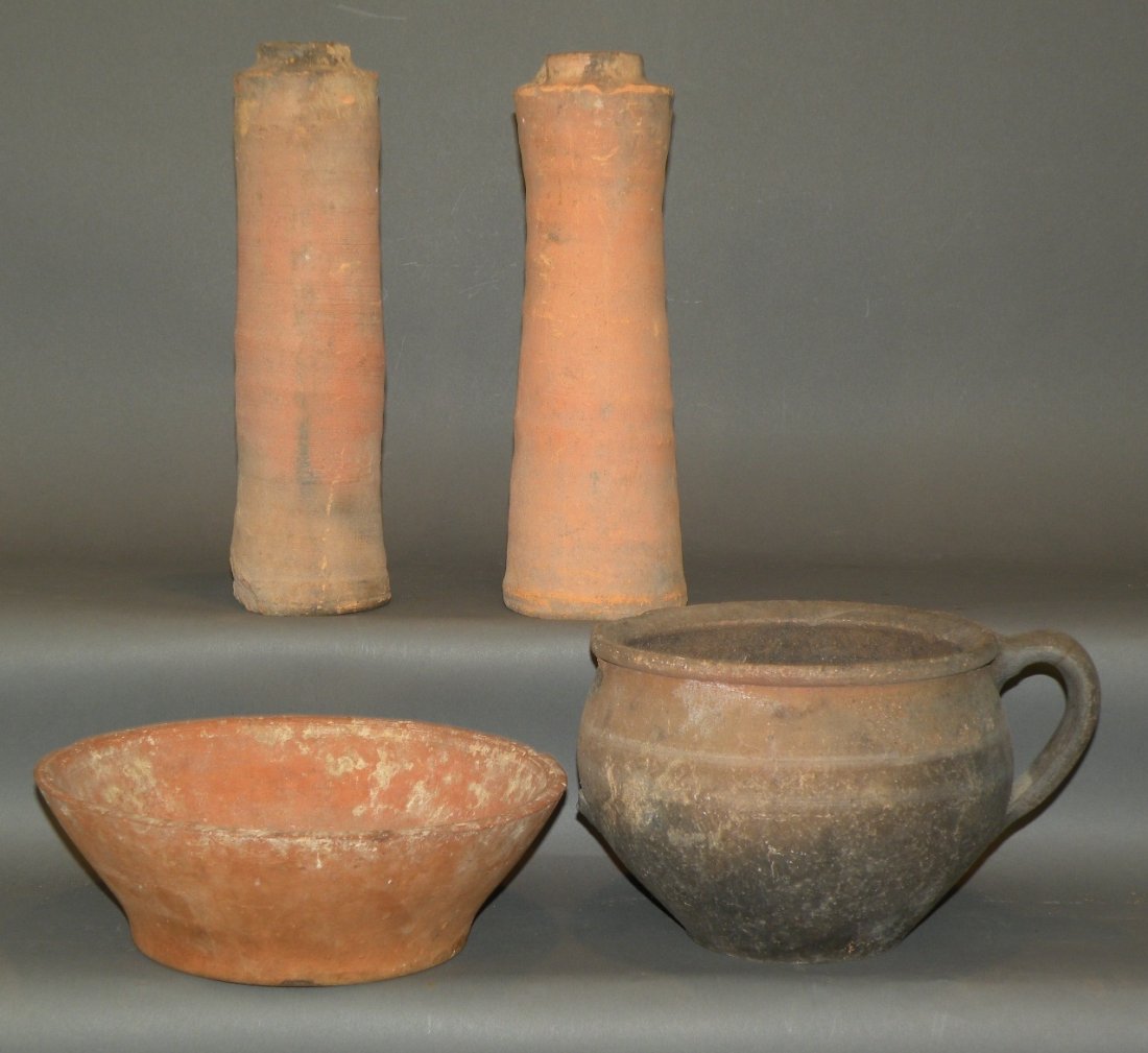 4 pieces of early redware: ca. 1700-1800s; “Thunder Mug” chamber pot with applied handle, 6”; 2 drain spouts/pipes, 11 ½”; unglazed kitchen bowl found at recent excavation site in Lancaster City, 9 ¾”x 3”;