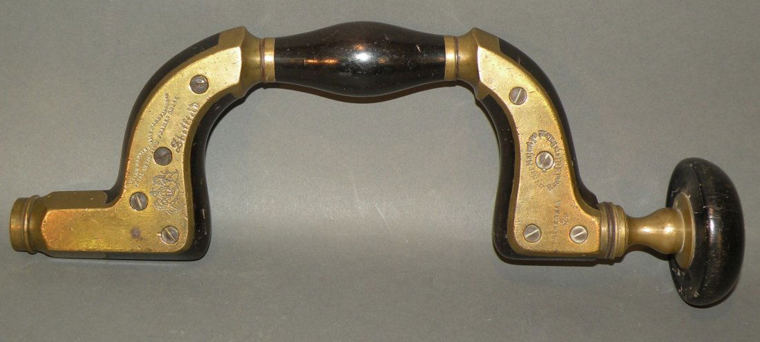 Marples ultimatum brace: ca. 1850; William Marples brass framed brace with Ebony knurl and infill, ivory inlay and brass cap, 13”;