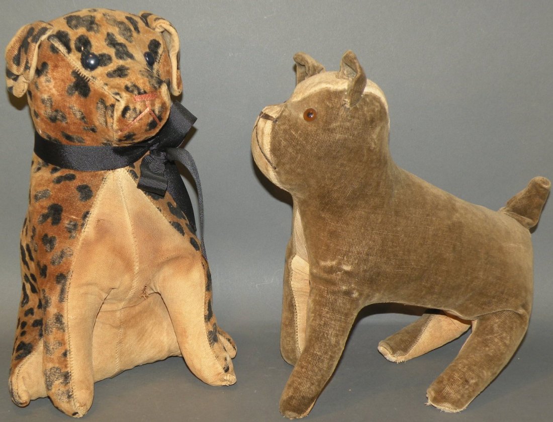 2 straw stuffed dogs: ca. 1900; sitting spotted dog with button eyes, 13”; felt cloth bulldog with celluloid eyes, 12”;